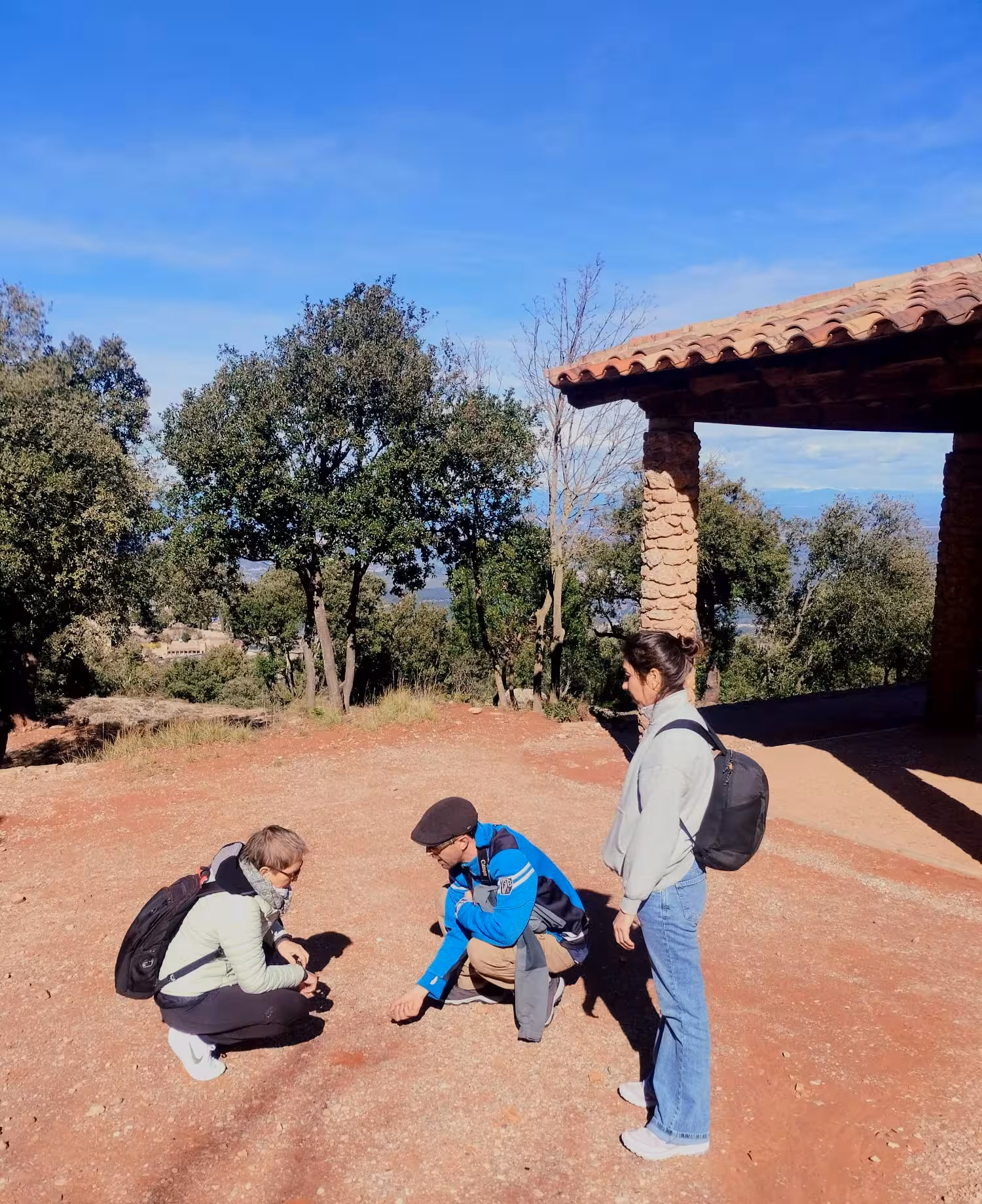 Private Montserrat hike near Santa Cecilia with guide and hikers exploring trailhead viewpoint in Catalonia