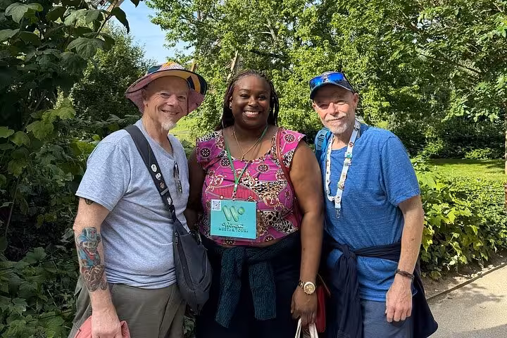 Private Paris tour guide with guests during a half-day city walk before Seine cruise and Louvre entry