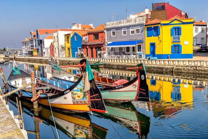Experience the vibrant canal views and traditional boats in Aveiro on a private 2-day Porto tour.