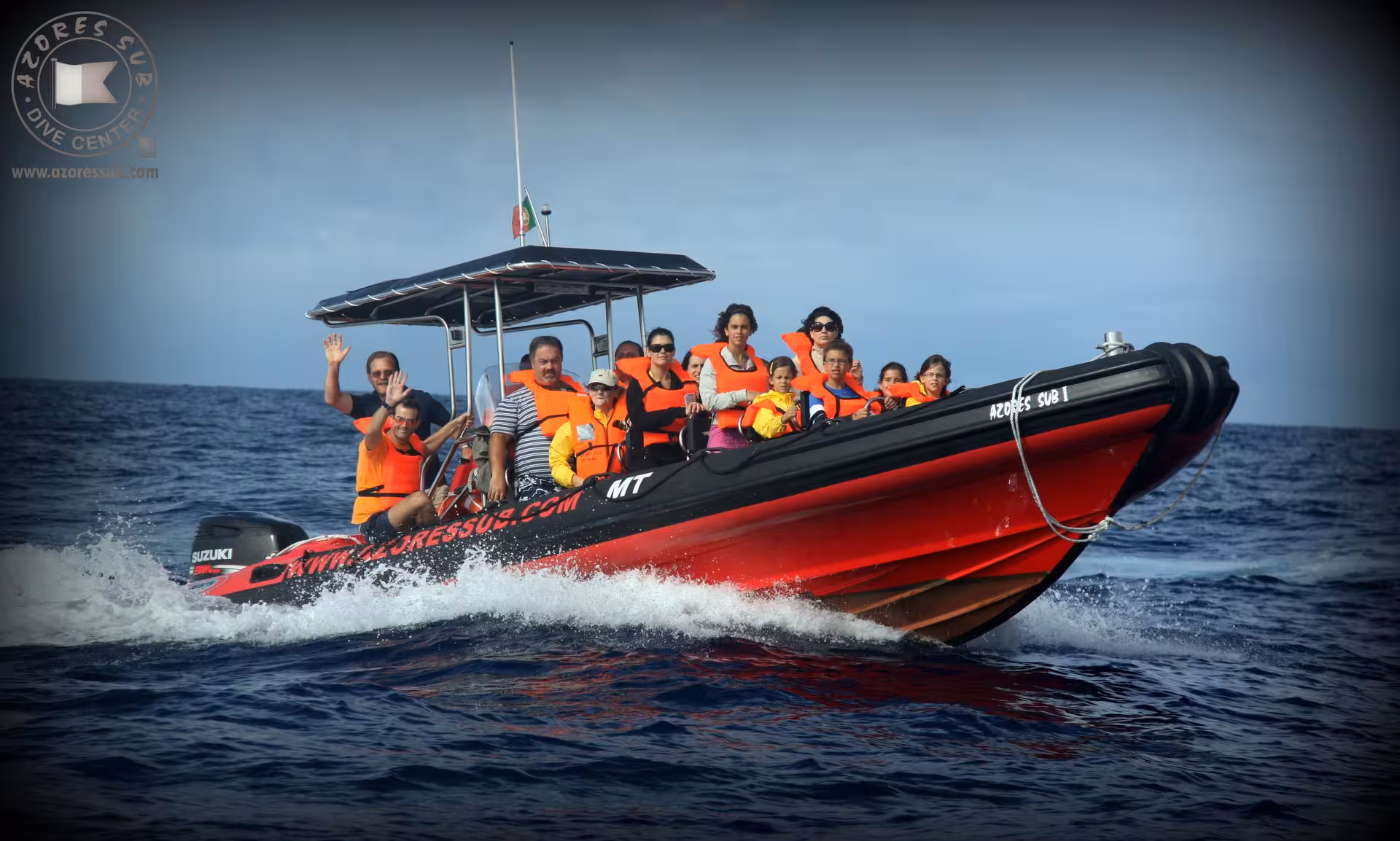 Private Azores RIB boat tour with guests in life jackets speeding across the Atlantic near São Miguel