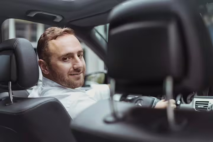 Friendly local driver in luxury car for private 2-hour Santorini sightseeing tour with hotel pickup and drop-off