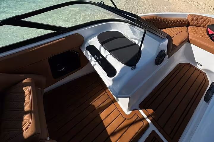 Luxury private sea taxi boat interior with cushioned seats, ideal for Hurghada to Giftun Islands excursion