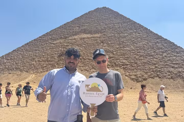 Guests with local guide at Dahshur Red Pyramid, private Saqqara Memphis tour with desert pyramid backdrop