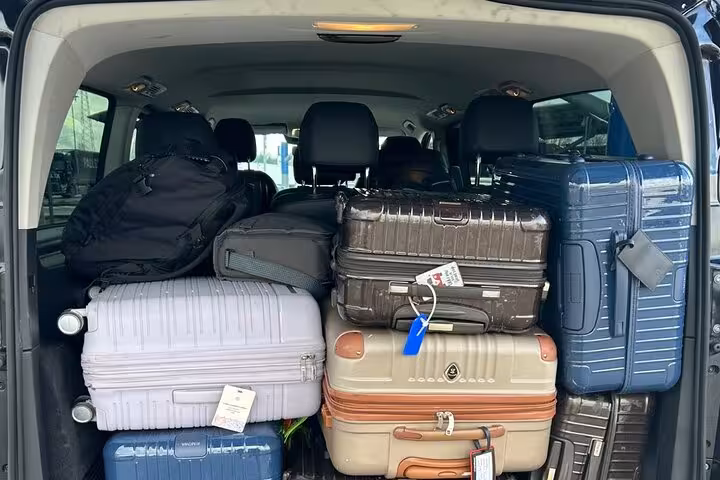 Spacious vehicle loaded with luggage for convenient private transfer from Civitavecchia to Rome.