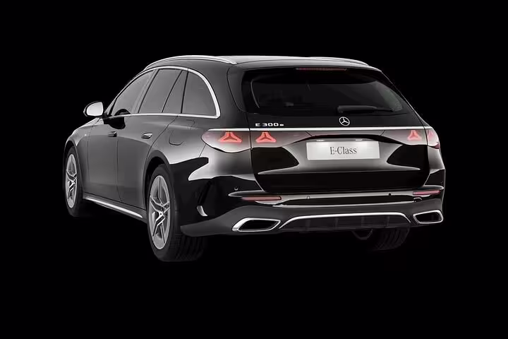 Luxurious black Mercedes E-Class vehicle offering private transfer services from Lisbon Metropolitan Area to the airport.