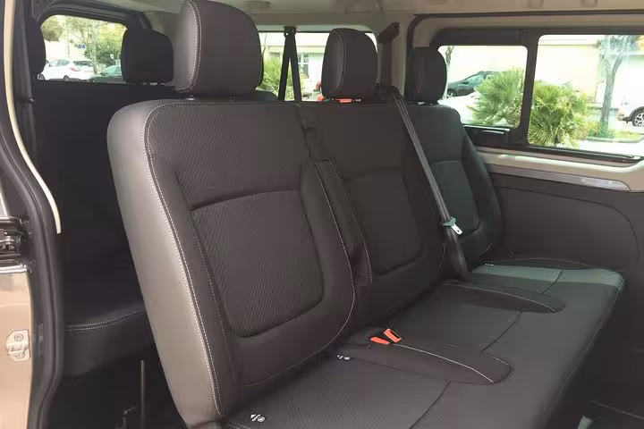 Spacious minivan rear seats for private transfer Marseille to Montpellier, comfortable air-conditioned ride