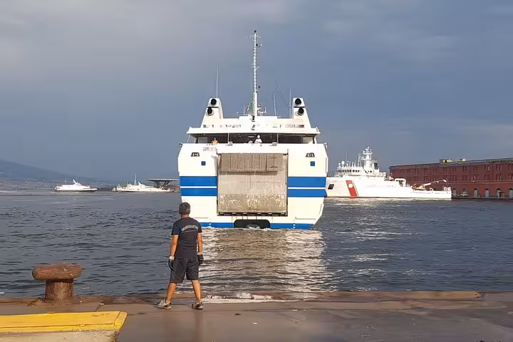 Ferry departing Naples Beverello pier, ideal drop-off point after private transfer from Rome or Fiumicino