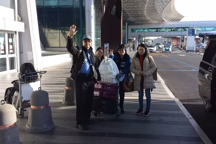 Driver meets travelers at Fiumicino airport for private transfer to Naples Beverello pier with luggage