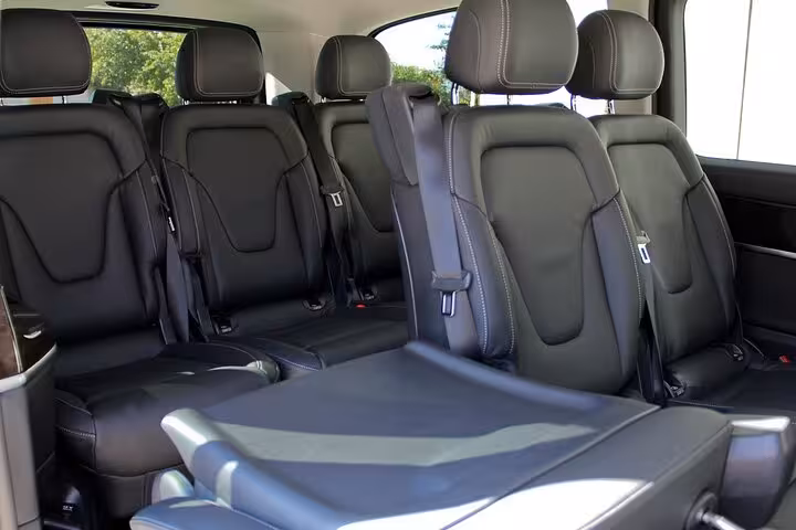 Spacious and comfortable interior of a private transfer van, ideal for the Sorrento to Positano journey.