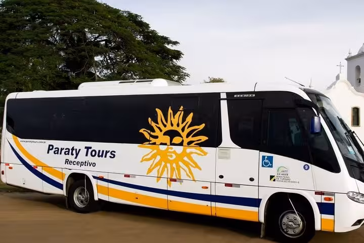 Modern Paraty Tours bus offering private transport from Rio de Janeiro to Paraty, featuring accessible travel options.