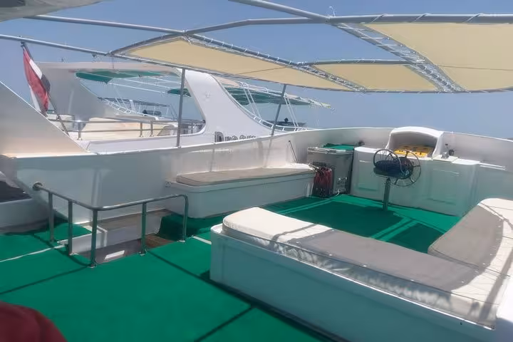Shaded sun deck and seating on a private yacht cruise from Hurghada to Soma Bay, Safaga and Sahl Hashesh