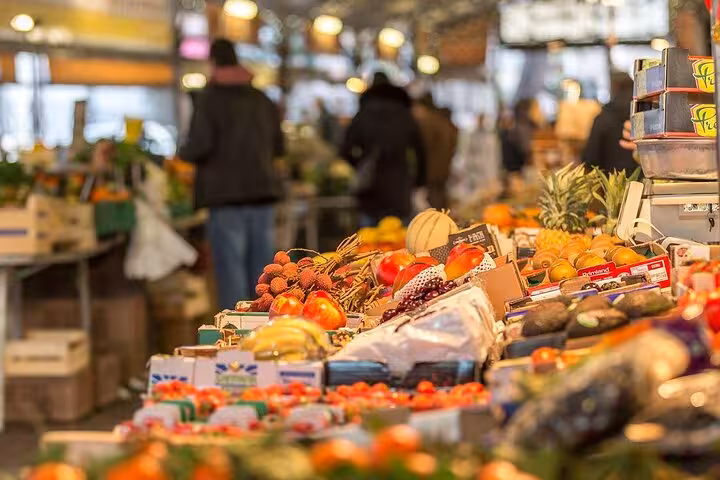 Vibrant Provencal market stall with fresh produce on wine tasting and countryside tour.
