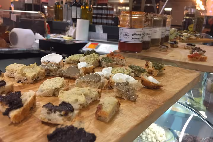 Provence food tasting board with tapenade, goat cheese and spreads at a local market on a slow-paced tour