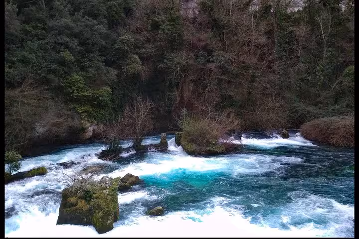 Turquoise river rapids in Provence forest gorge, scenic stop on a slow travel, at-your-own-pace tour