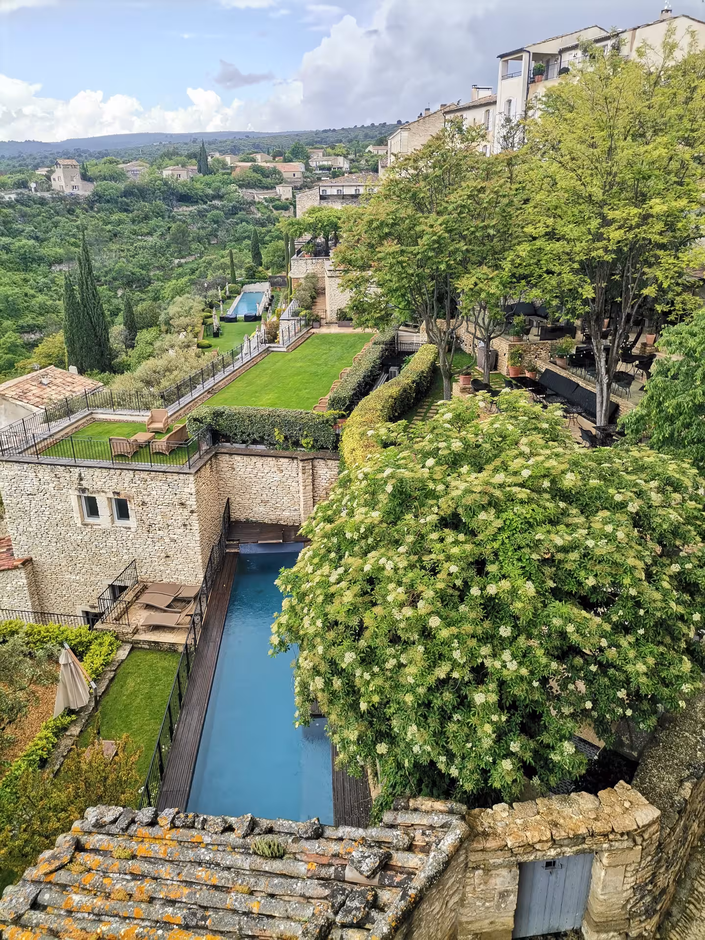Hilltop Provence village gardens and pool overlook, scenic stop on a Provençal Picnic Tour in the Luberon