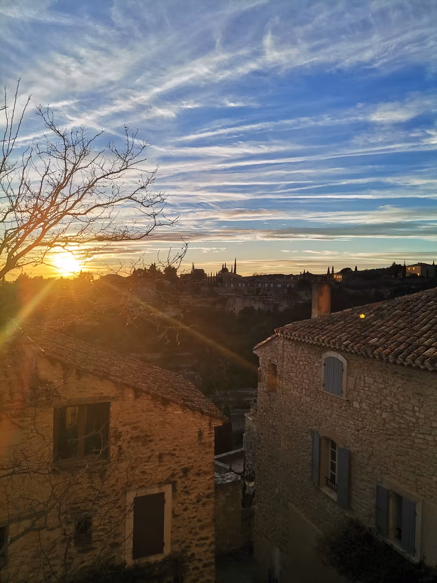 Sunset over a hilltop Provence village with stone houses, ideal for a 14-day Christian heritage cultural tour