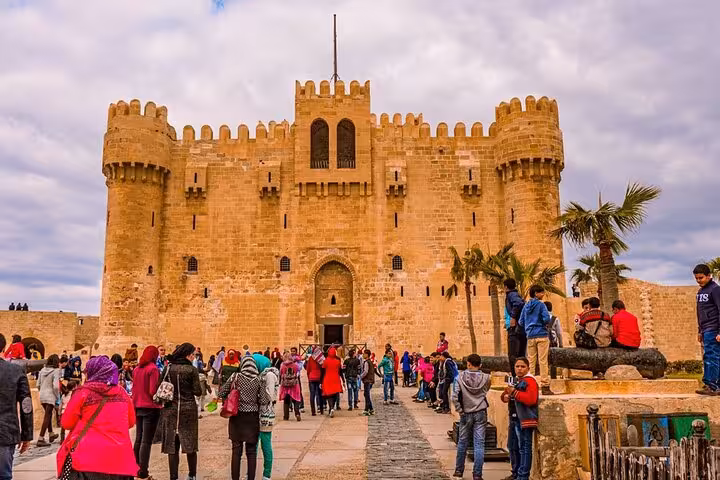 Crowds entering Qaitbay Citadel in Alexandria on a private historical guided day tour from Cairo, Egypt