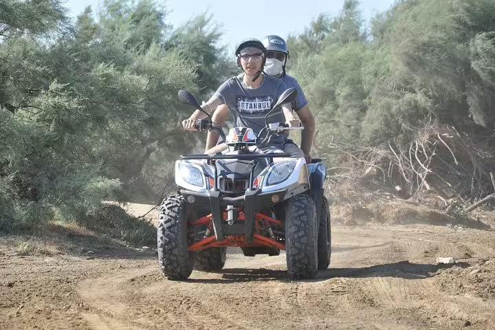 Cruise guests enjoy thrilling quad riding adventure through scenic trails near Kusadasi Port.