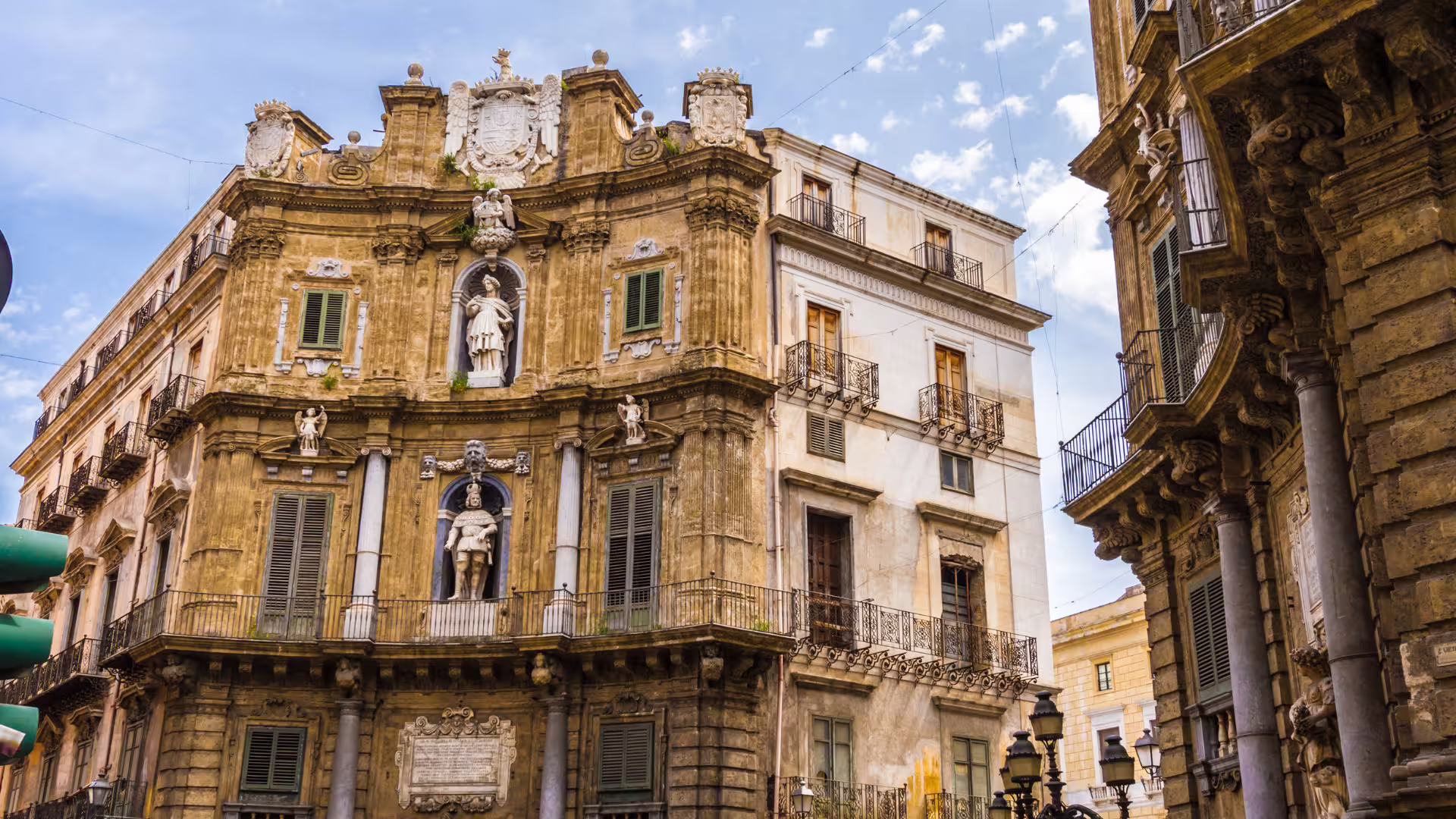 Historic Quattro Canti square in Palermo with ornate baroque palaces, a key stop on private Monreale and Mondello tours