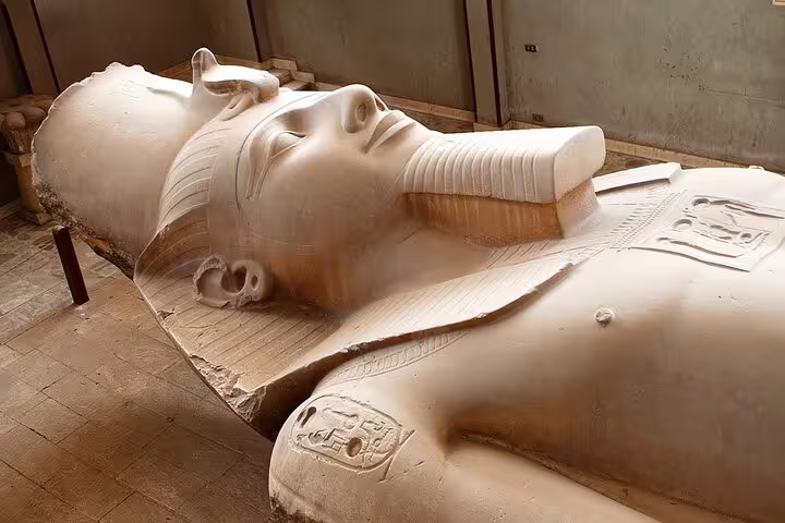 Colossal alabaster statue of Ramses II at Memphis, Egypt, on Cairo layover tour to pyramids
