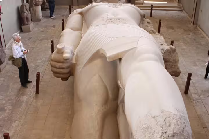 Giant Ramses II statue viewed from above in Memphis museum, highlight of Dahshur Pyramid and Memphis day trip