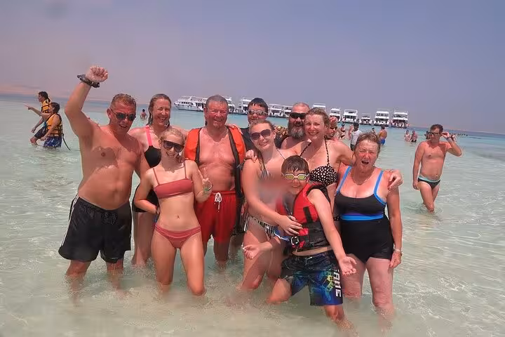 White Island VIP boat trip with sun deck, snorkelers, aerial sandbar view and Ras Mohamed reef diving