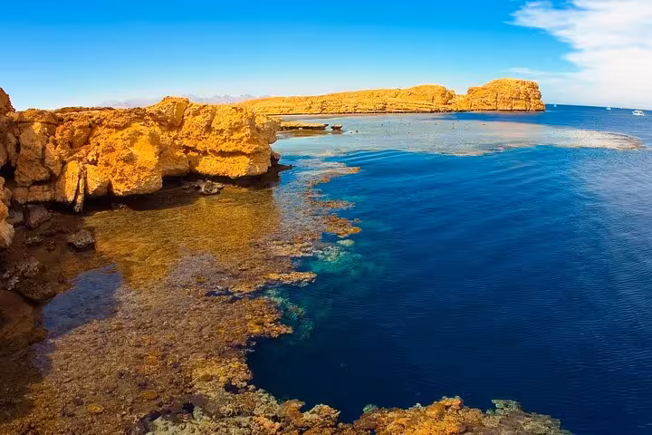Ras Mohammed cliffs and coral reef shoreline, Red Sea snorkeling stop on half-day bus tour from Sharm