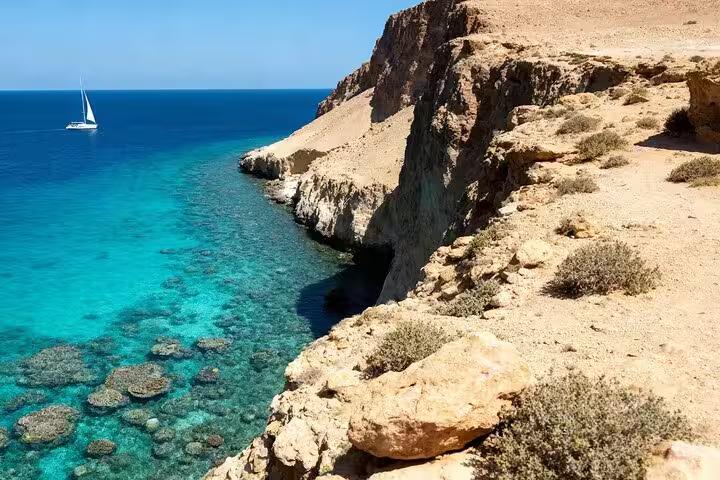 Ras Mohammed National Park coastal cliffs and coral reef waters, half-day bus tour from Sharm El Sheikh