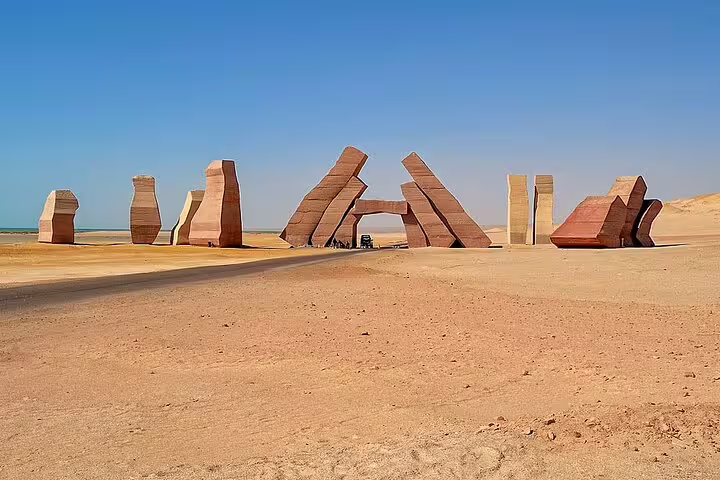 Ras Mohammed National Park gate sculptures on desert road, half-day bus tour from Sharm El Sheikh