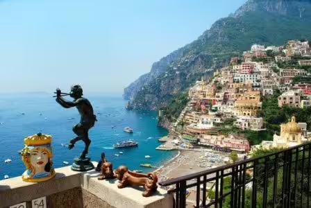 Sunset view from Ravello with historic villa towers overlooking the Amalfi Coast and Mediterranean Sea on guided tour