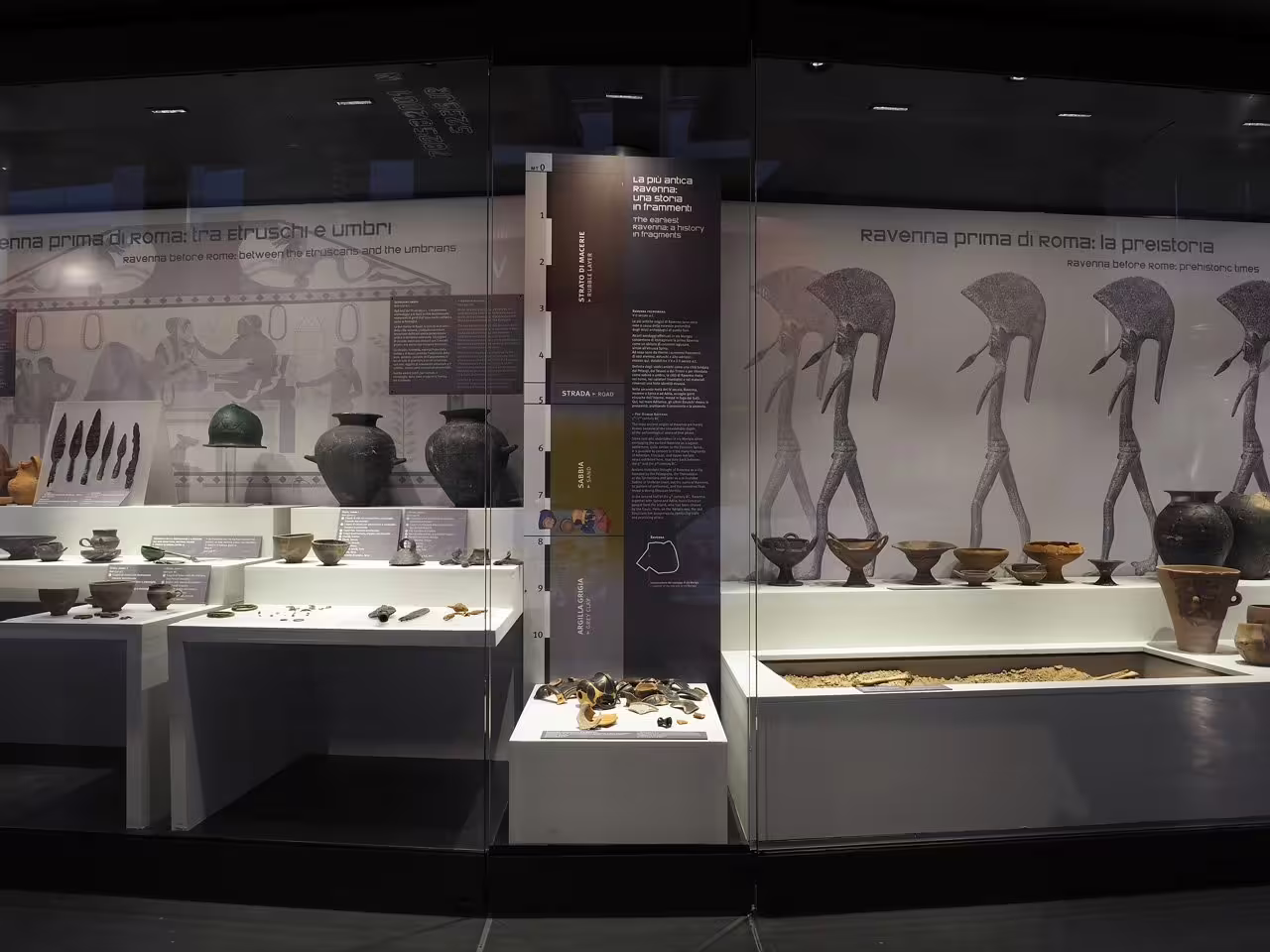 Interior display at Ravenna Classis Museum showing prehistoric Ravenna artifacts, ceramics and interpretive panels