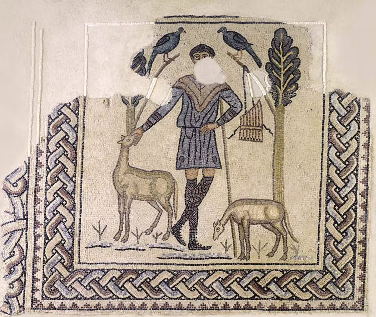 Domus Tappeti di Pietra mosaic in Ravenna showing a hunter with deer and birds, intricate Roman floor art