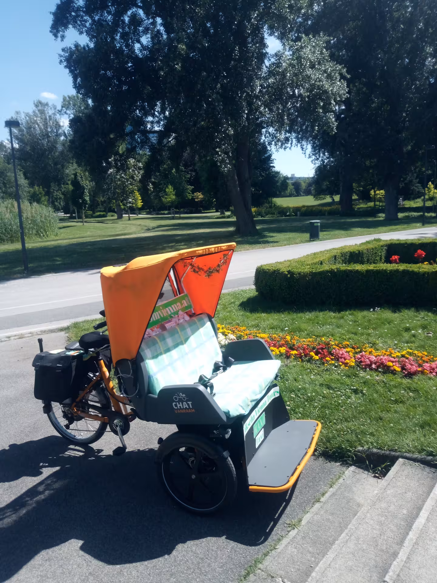 RAXI panoramic electric rickshaw in Vienna park, eco-friendly sightseeing ride with private guide