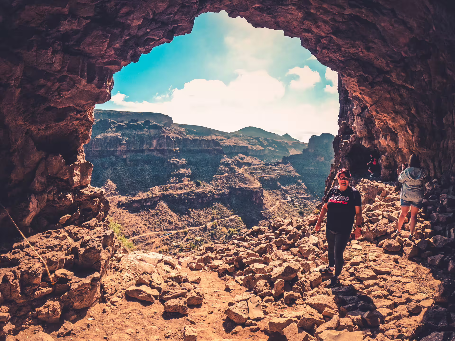 Explore breathtaking rocky caves and panoramic views on The Red Canyon Tour with small group adventures.