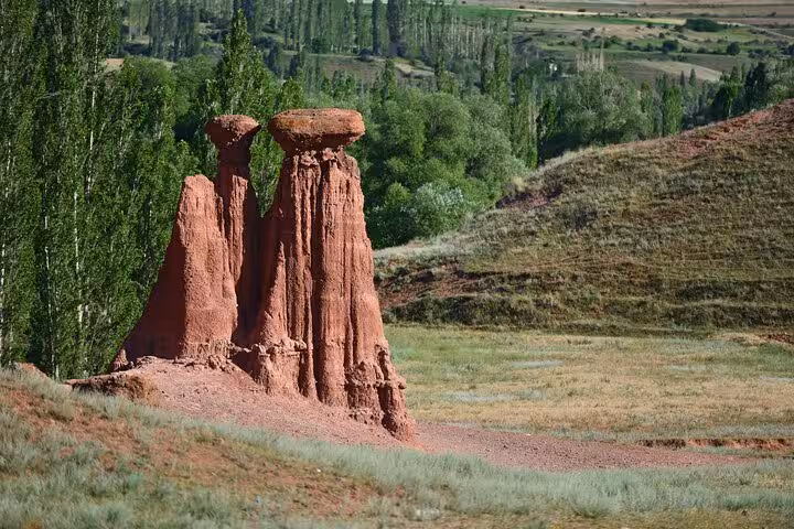 Red fairy chimneys near Erzurum countryside, scenic nature stop on an all-inclusive private 2-day tour