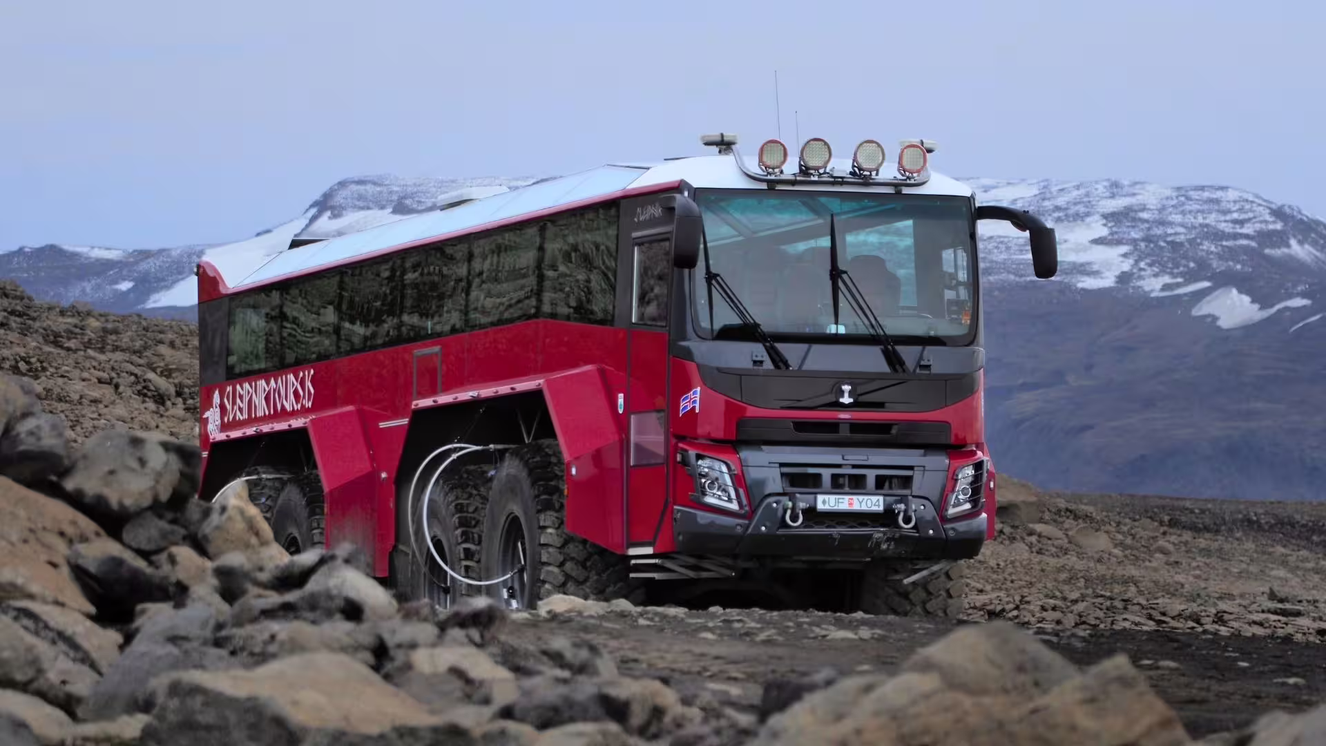 Red Glacier Monster Truck on rugged highland track en route to Langjökull Glacier tour from Gullfoss