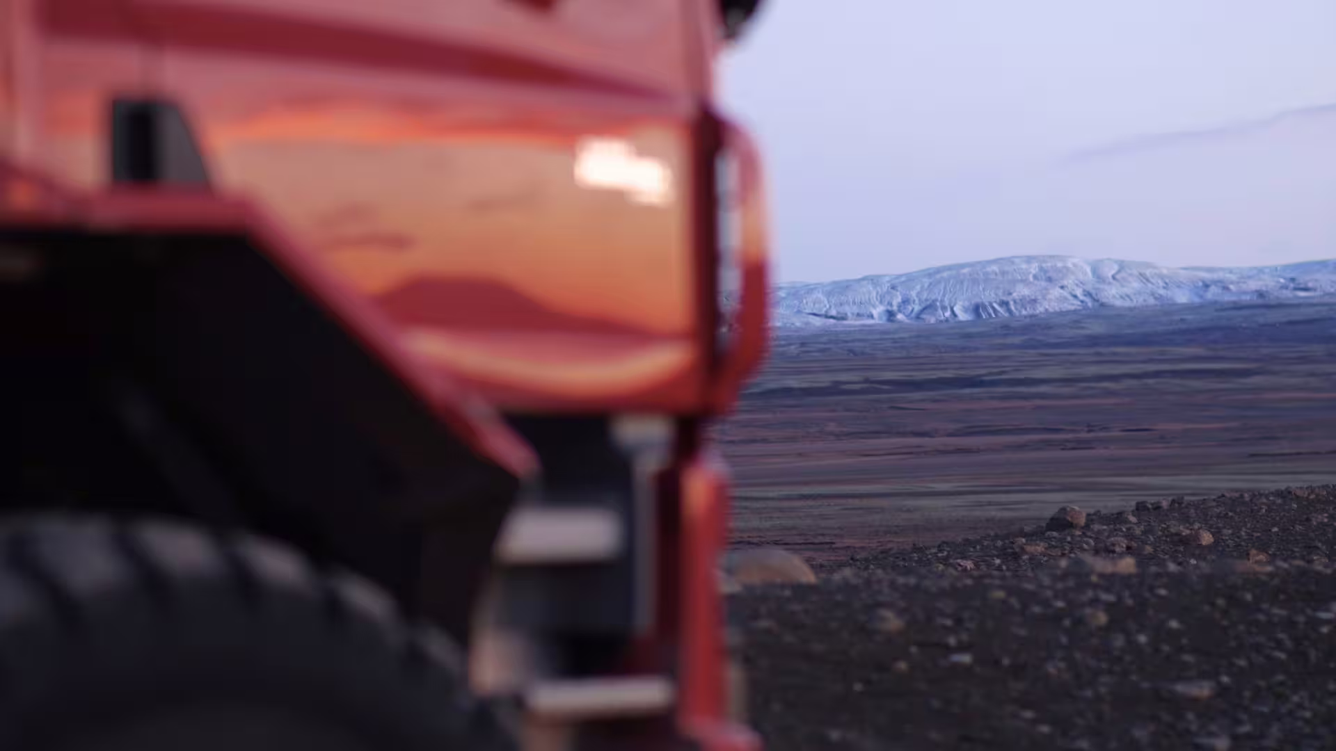 Red glacier monster truck on Icelandic highlands en route to Langjökull from Gullfoss, off-road adventure tour