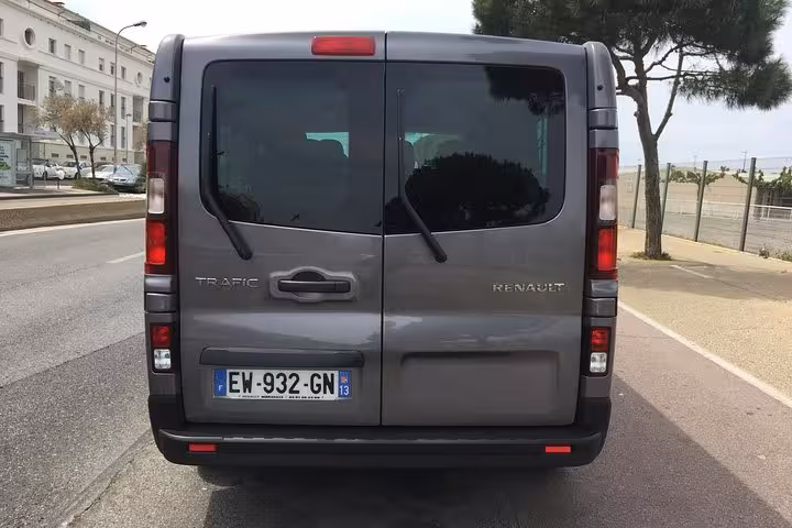 Rear view of Renault Trafic van for private transfer Marseille to Lyon, reliable luggage-friendly transport