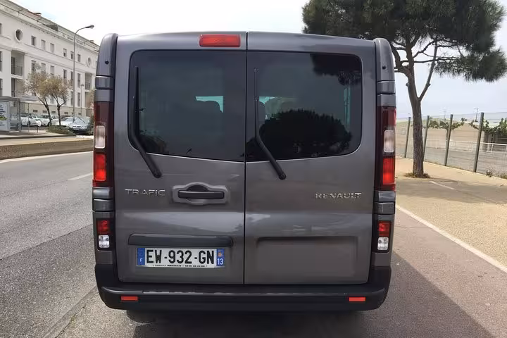Rear view of Renault Trafic van used for private transfer Marseille to Nîmes, secure luggage and smooth travel