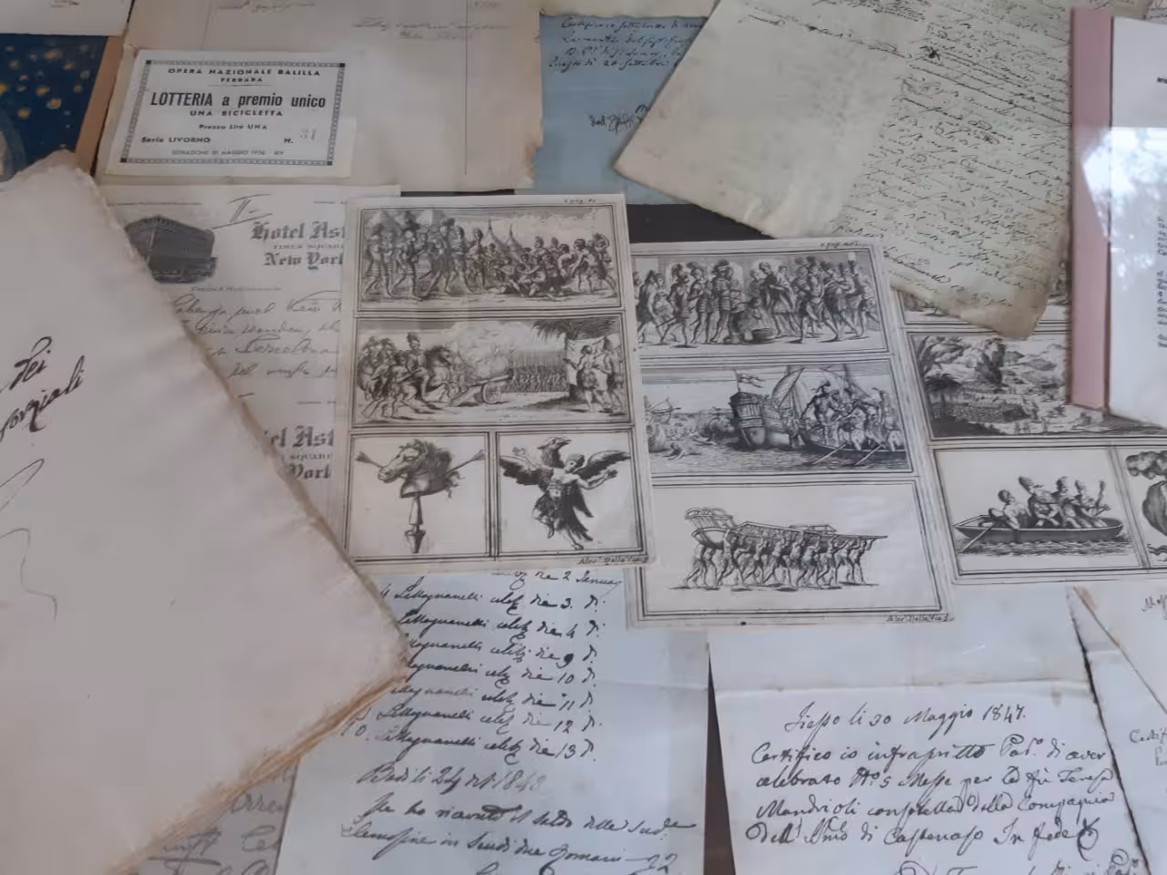 Historic letters and illustrated prints at Renzo Savini House Museum, Bologna, on multilingual guided visit