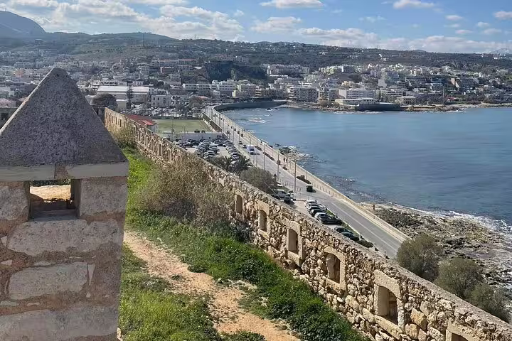 Scenic view of Rethymno coastline and historic fortifications, perfect for exploring on a private tour from Chania.