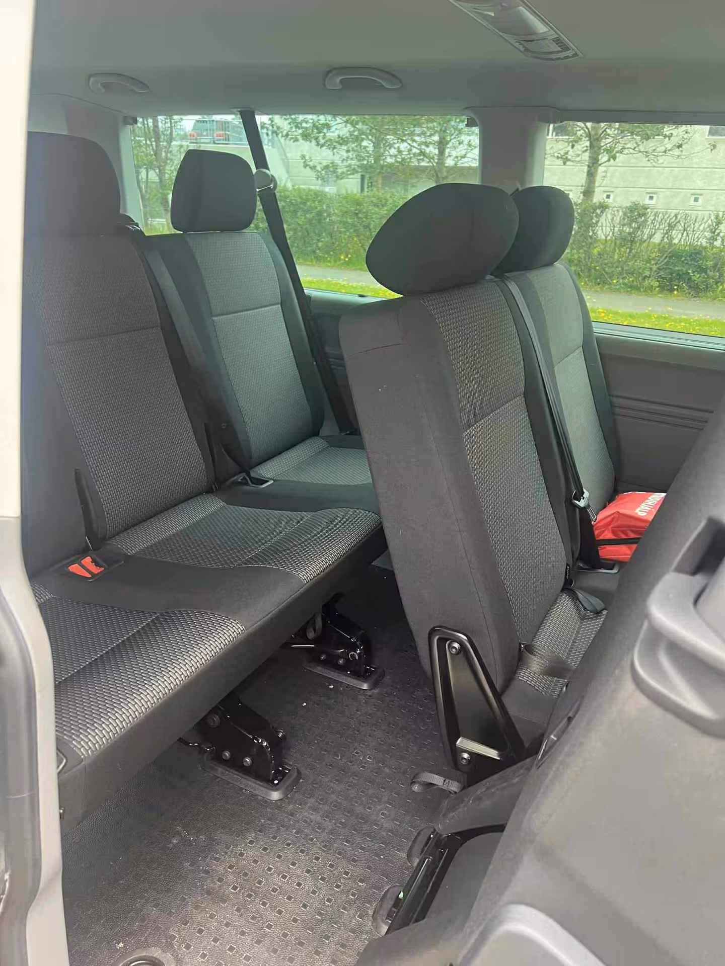 Spacious Reykjavik Golden Circle tour minivan interior with reclining seats for scenic Iceland day tour comfort