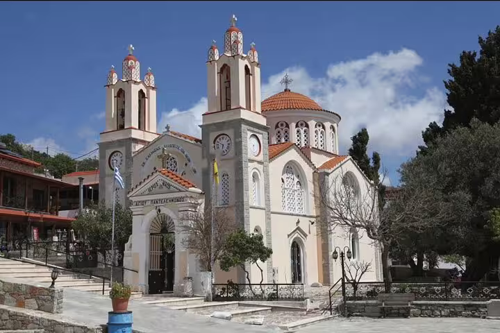 Historic church with ornate architecture in Rhodes, Greece, offering picturesque views, perfect for a scenic wine tasting tour.
