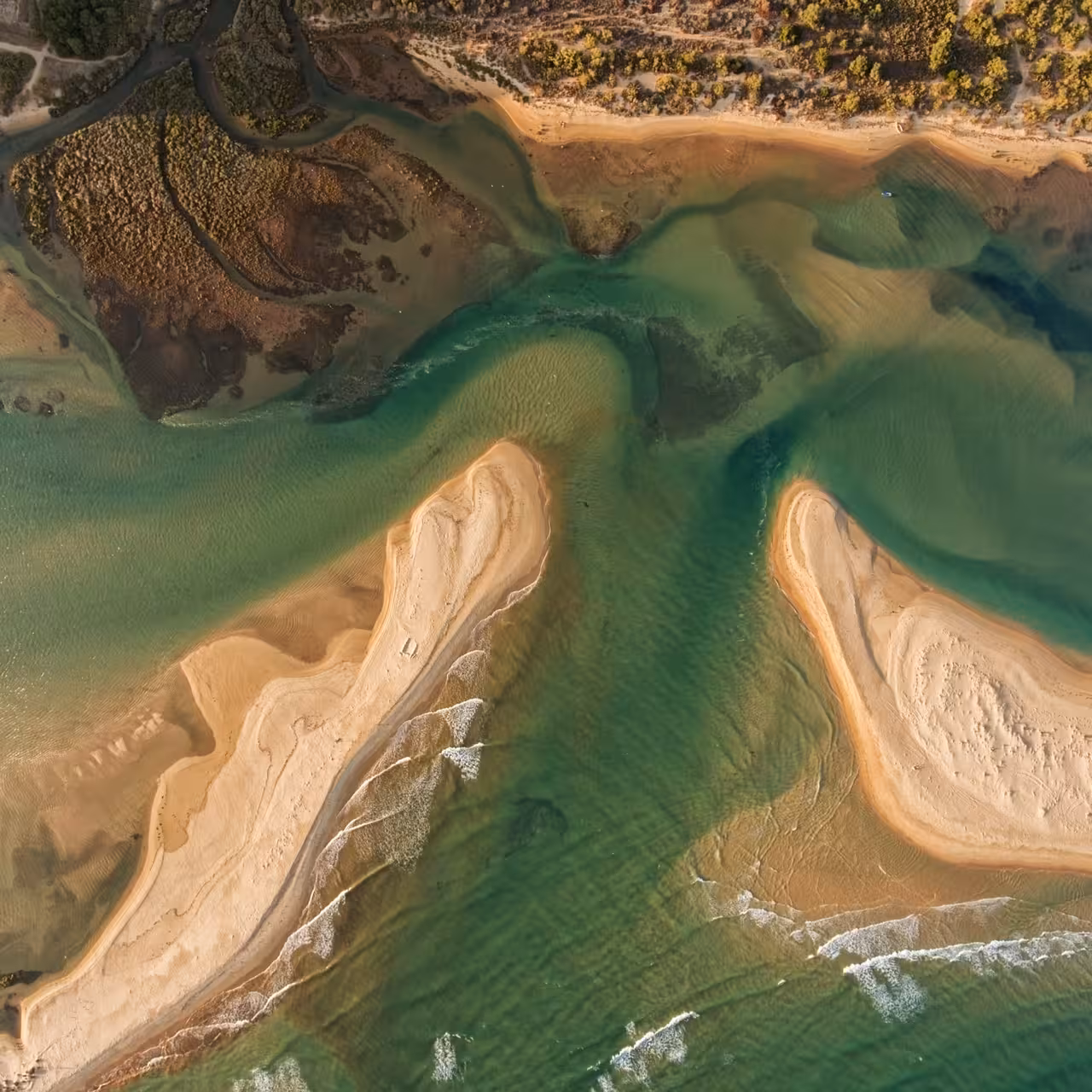 Aerial view of Ria Formosa lagoon sandbanks and tidal channels on a 3-island full-day boat tour from Faro