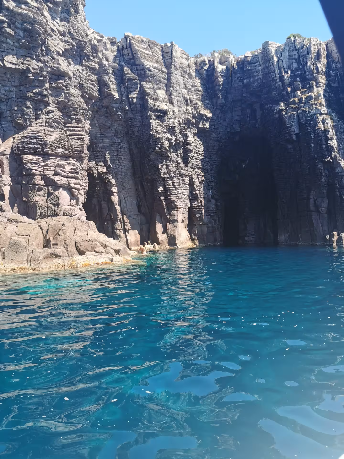 Explore stunning coastal cliffs and clear blue waters on the RIB tour from Sant'Antioco to Carloforte.