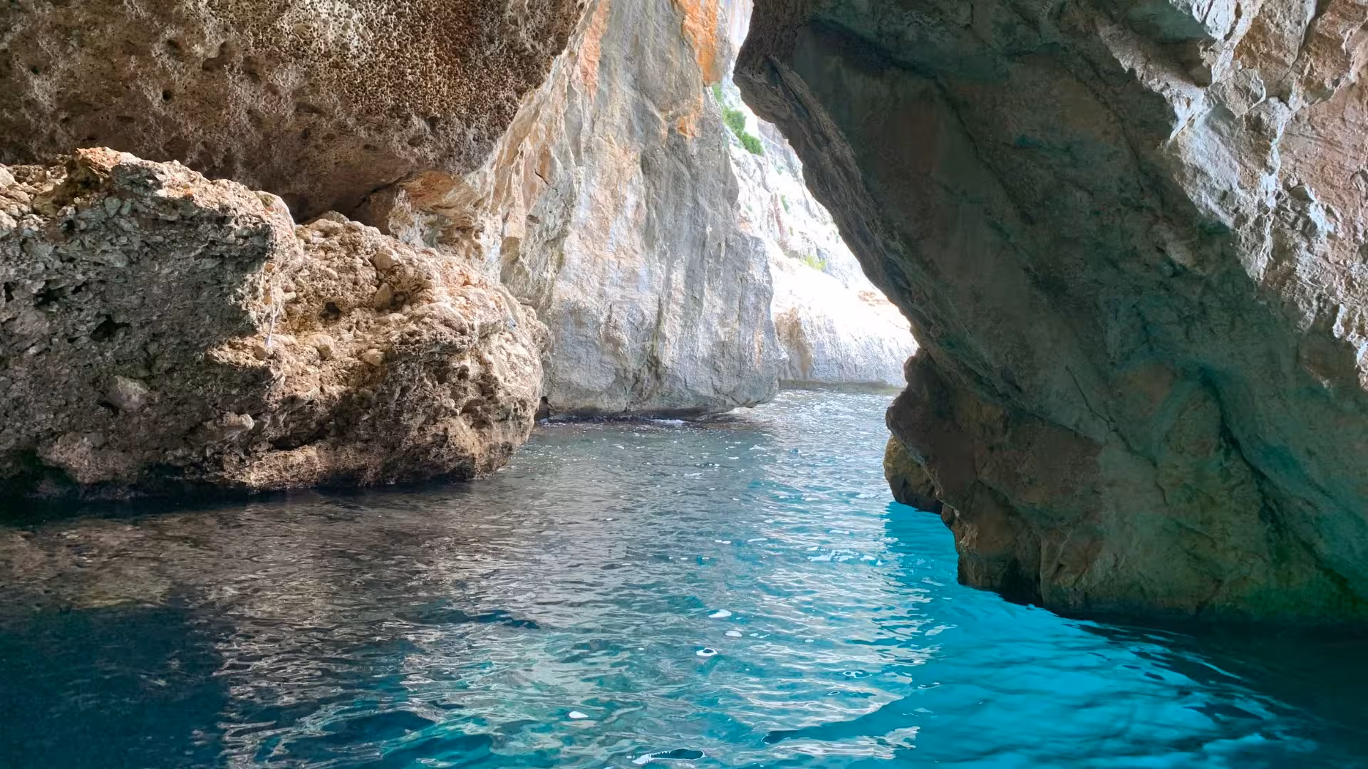 Discover hidden sea caves and vibrant blue waters on the scenic RIB trip between Cala Luna and Cala Goloritzé.