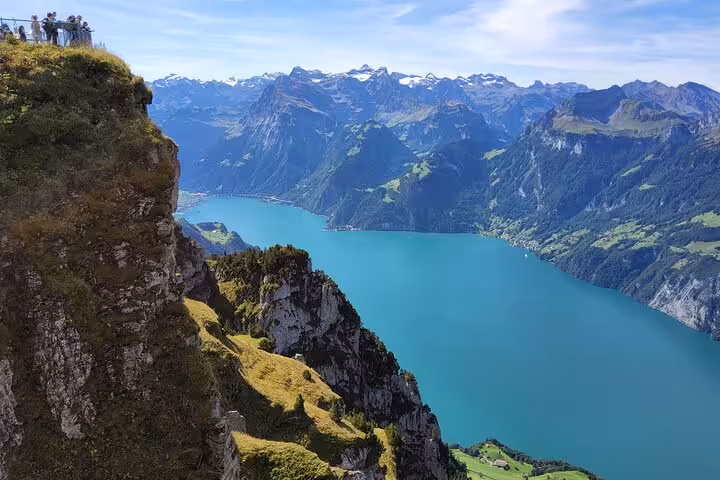 Rigi viewpoint above Lake Lucerne on a Zurich day trip, showcasing Swiss Alps panorama and steep funicular ride
