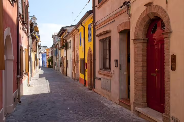 Colorful old town street in Rimini, Italy, ideal stop on a self-guided scavenger hunt highlights tour