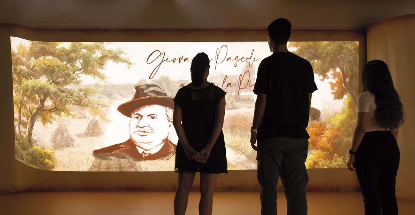 Visitors viewing multimedia exhibit at Rimini Piadina Museum, part of piadina tour with lunch or dinner