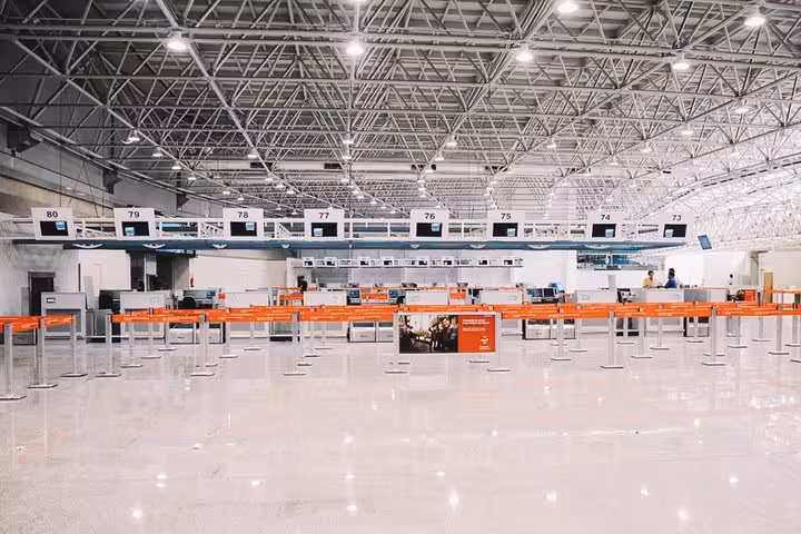 Spacious check-in area at Rio de Janeiro airport, starting point for convenient shuttle service to Paraty.